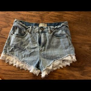 Free people jean shorts with lace